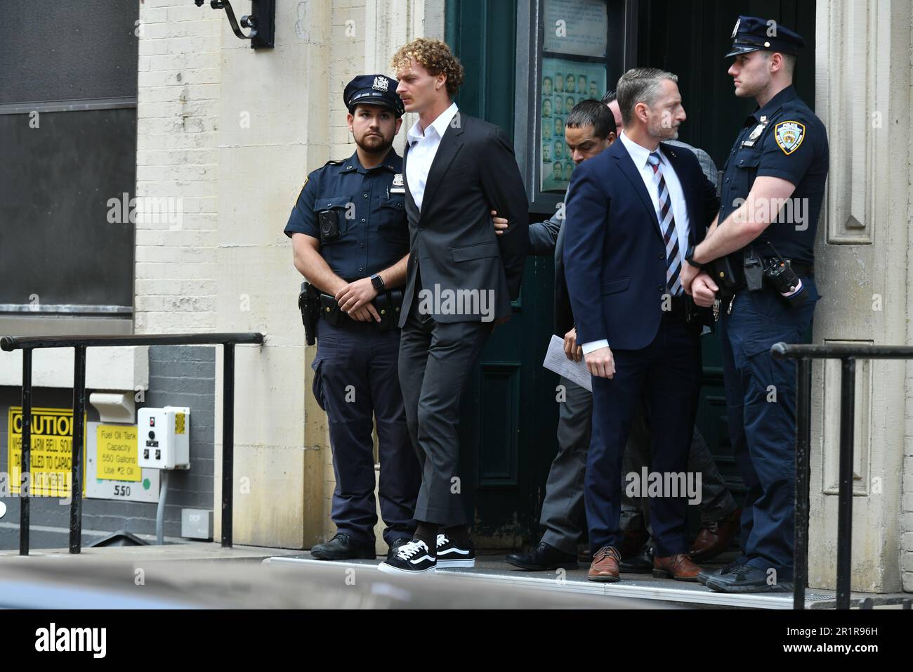 Daniel Penny surrenders to police at the 5th precinct to face
