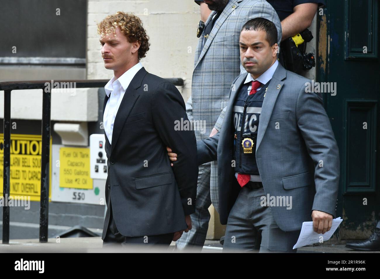 Daniel Penny surrenders to police at the 5th precinct to face