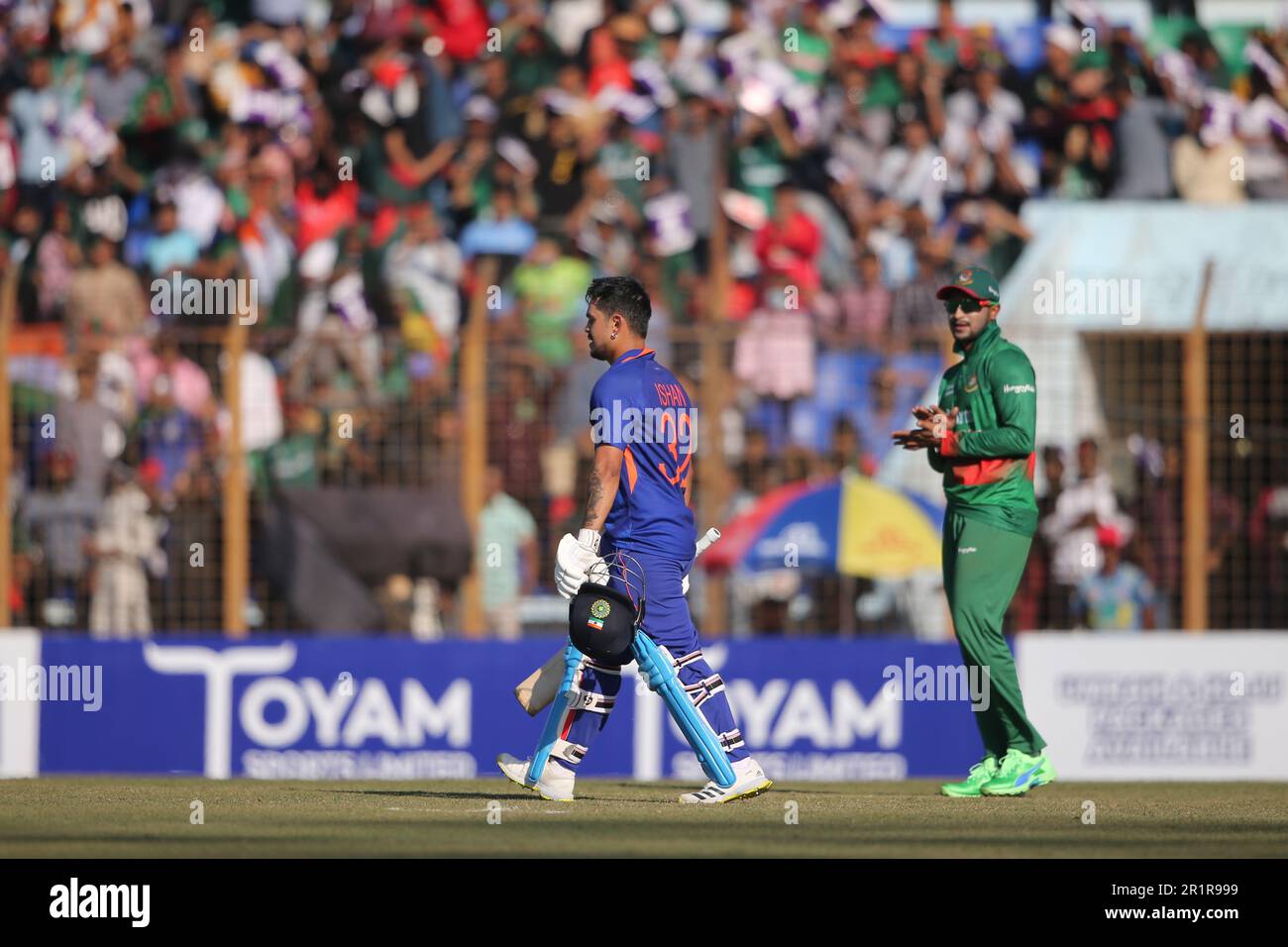 Shakib Al Hasan (R) clap as Indian batter Ishan Kishan celebrates his ...