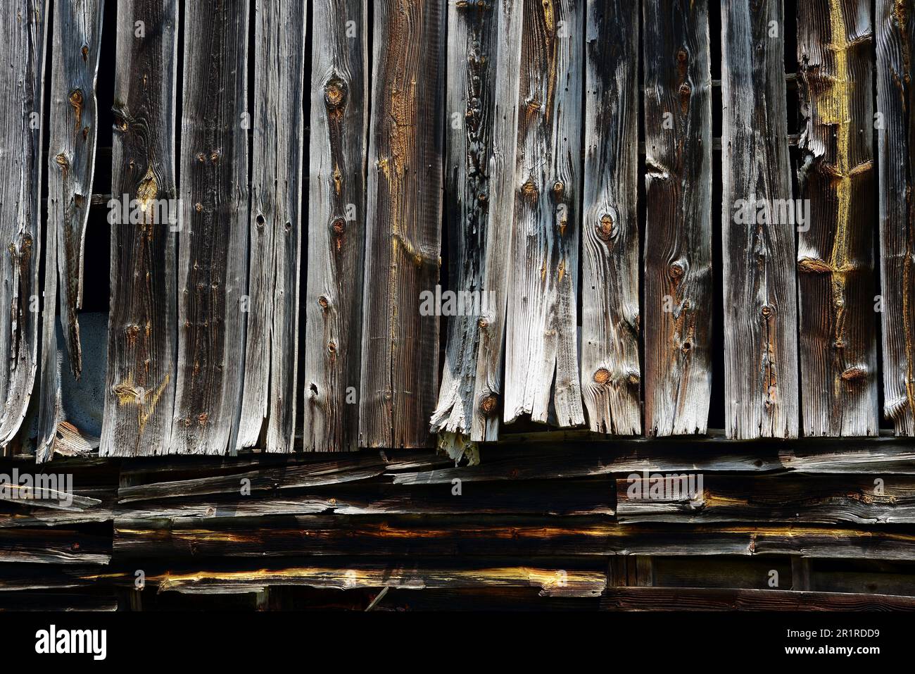 Weathered old barn with warped boards Stock Photo