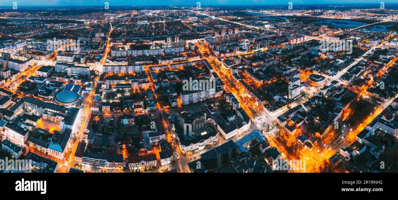 Brest, Belarus. Cityscape Skyline In Night Illuminations. Night Bird's-eye View Of Brest Market And Pedestrian Sovietskaya Street. Panorama, Stock Photo