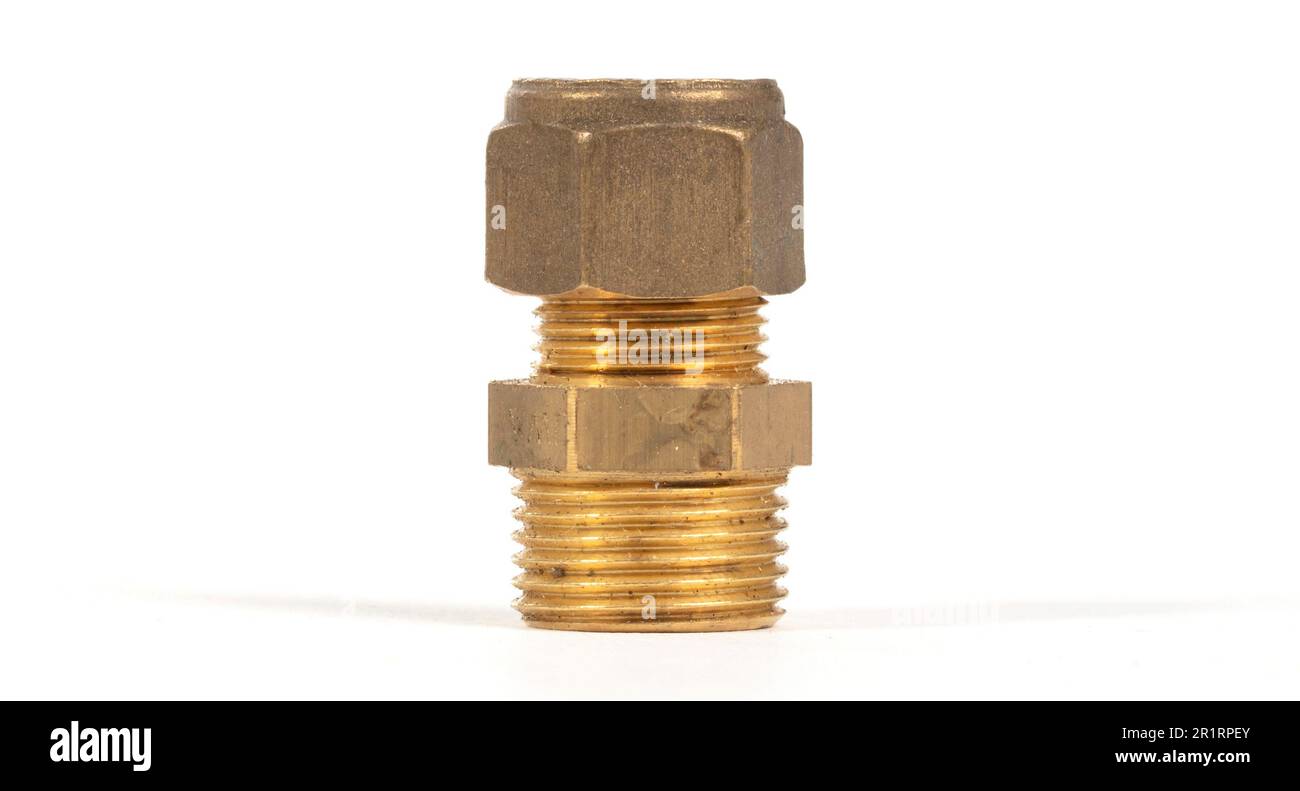 Brass fitting for plumbing pipes, connector for two different sizes, isolated on white Stock