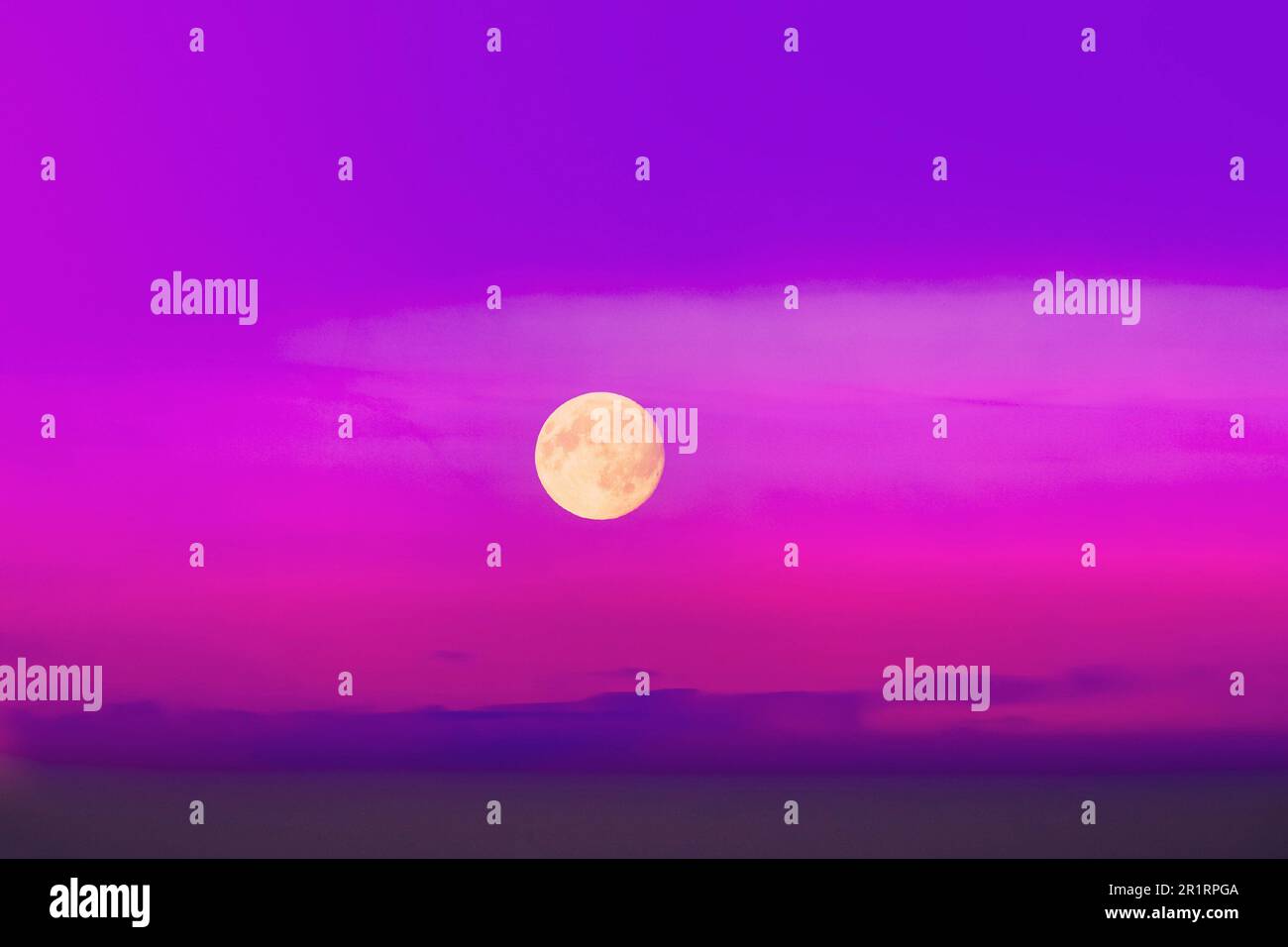Fool Moon In Pink Magenta Cloudscape Sky Background. Magic Night View. Wizzard Conception. Violet Purple Scenery Background Moonrise Above Foggy Land. Stock Photo