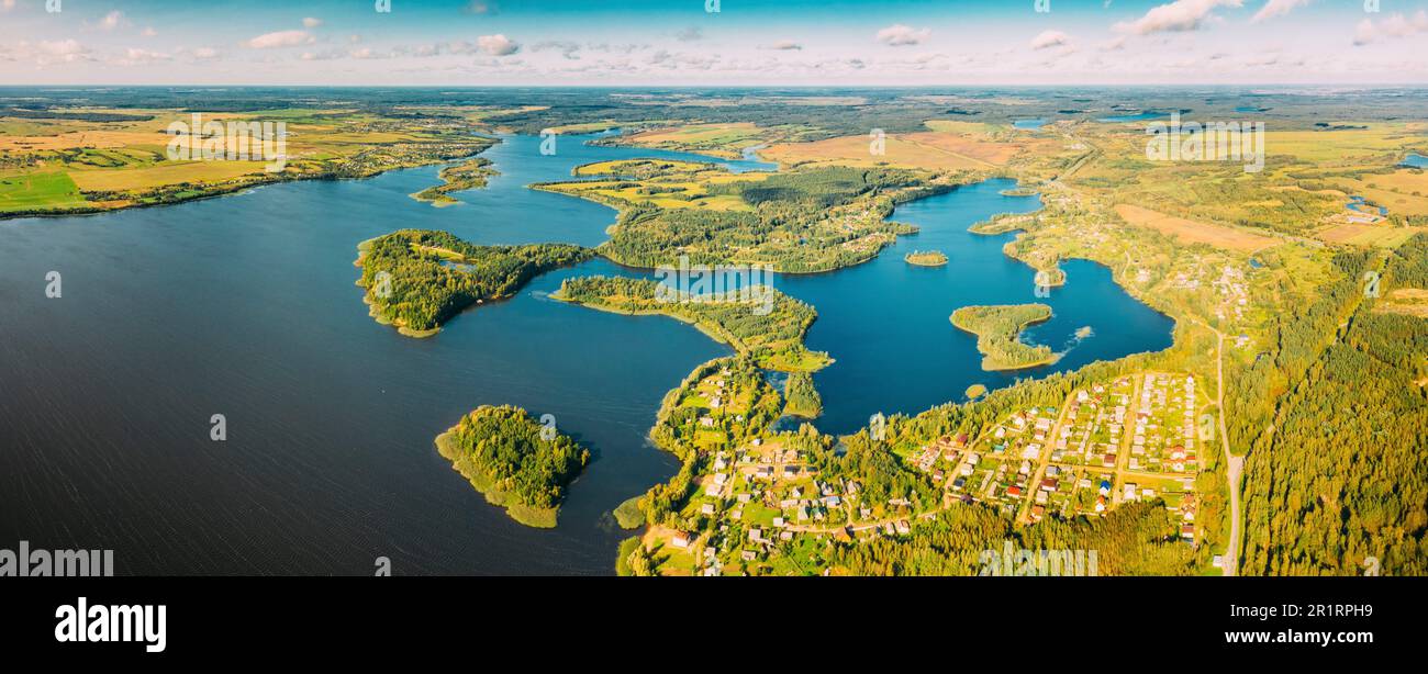 Lyepyel District, Lepel Lake, Beloozerny District, Vitebsk Region. Aerial View Of Residential Area With Houses In Countryside. Top View Of Island Stock Photo