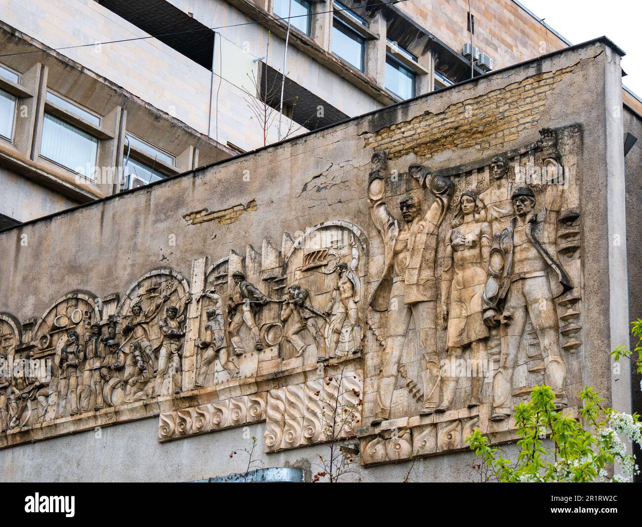 Derelict Buildings of the former Soviet Union: Communist Carving at the the United Board of the Energy System of Transcaucasia in Tbilisi, Georgia Stock Photo