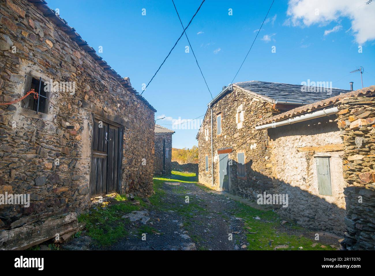 Street and house in ruins. El Muyo, Segovia province, Castilla Leon, Spain. Stock Photo