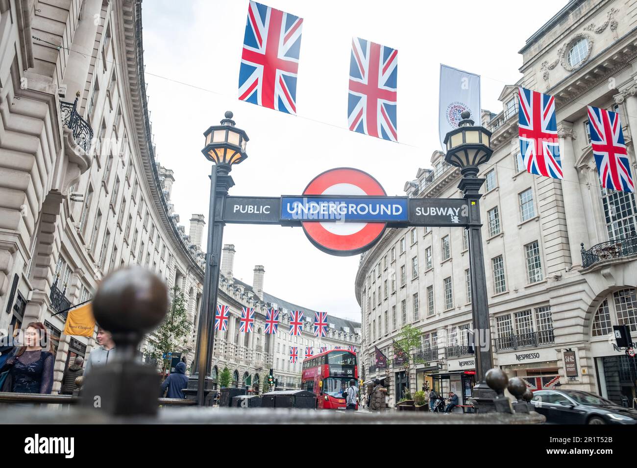 London- May 2023: View of Regent Street in London with Piccadilly Circus underground station in foreground. Stock Photo
