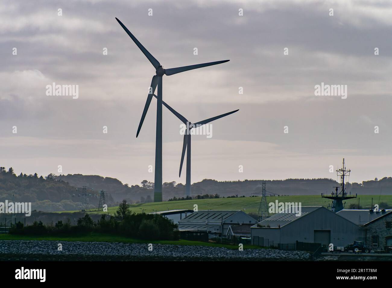 Wind power generators in the south of Ireland, landscape. Two wind