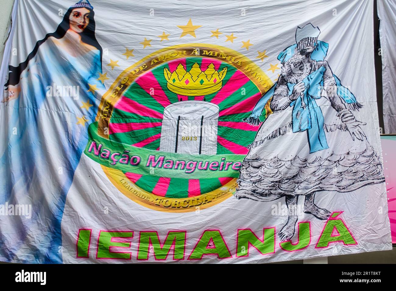 A textile flag of the school with the word Iemanja. The official name of the famous education building is: Grêmio Recreativo Escola de Samba Estação P Stock Photo
