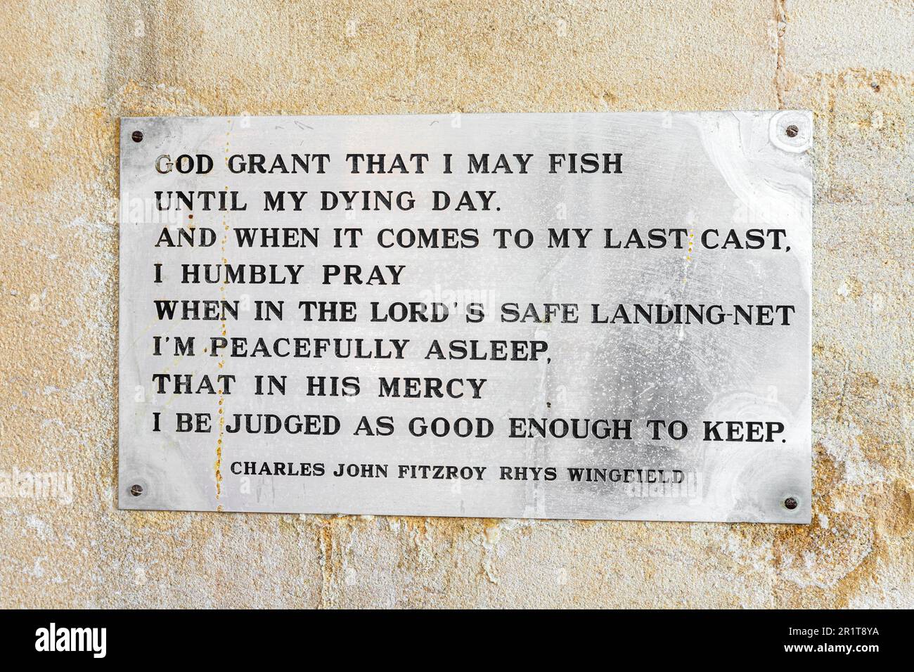 A fisherman's prayer in St Mary's church in the Cotswold village of Great Barrington, Gloucestershire UK. Charles Wingfield died in 1960. Stock Photo