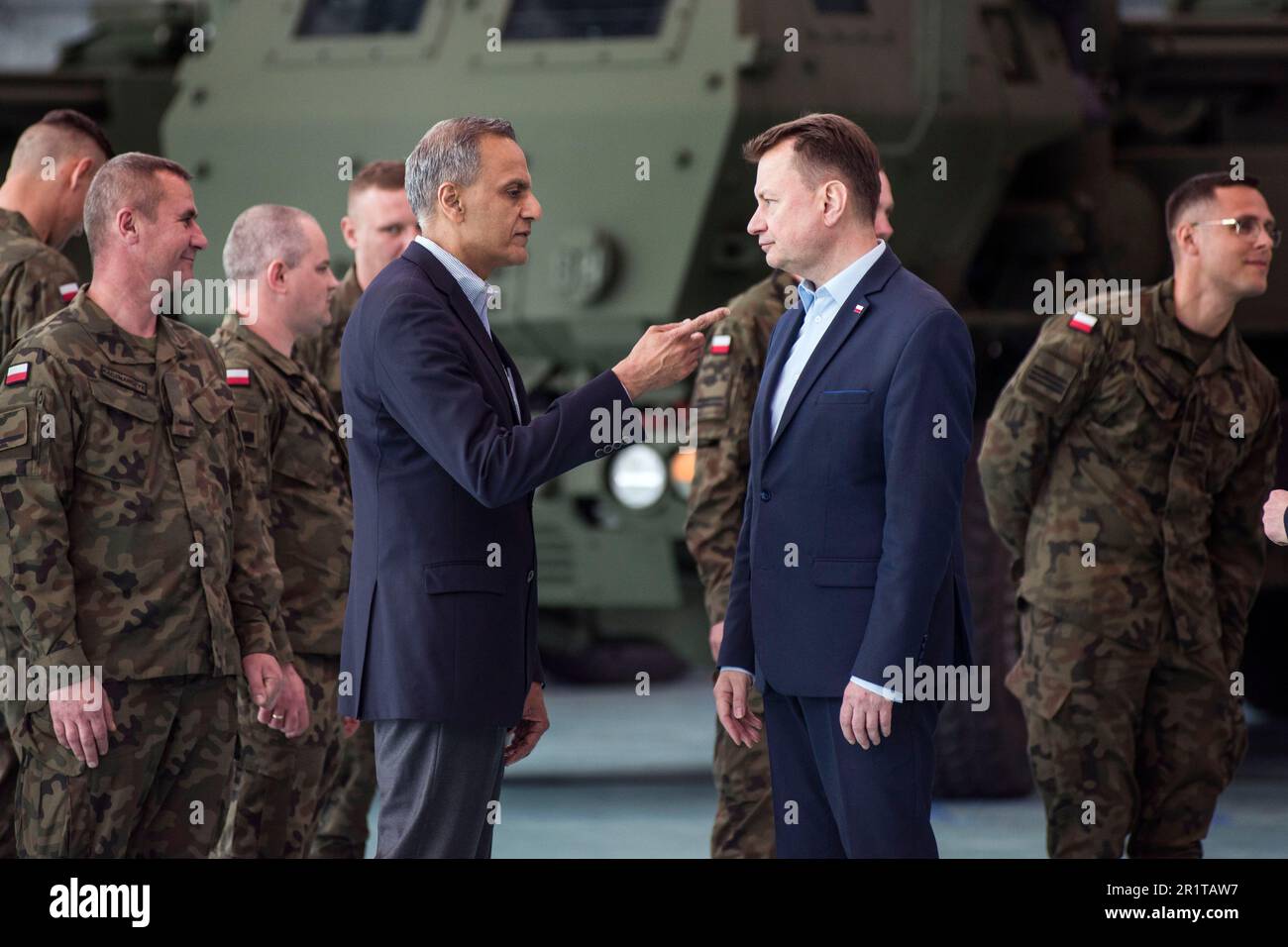 Minister of National Defense, Mariusz Blaszczak (R) and US Deputy Secretary of State for Management and Resources - Richard Verma (L) are seen at the ceremony at the military 1st Transport Aviation Base in Warsaw. On May 15th in Warsaw at the military 1st Transport Aviation Base in Warsaw, Mariusz Blaszczak, Deputy Prime Minister - Minister of National Defense took part in the event of delivery to Poland of the first Himars rocket launchers for the Polish Army.The delivery of the first pieces of the M142 HIMARS launchers is the result of the contract of February 2019 for the acquisition of the Stock Photo