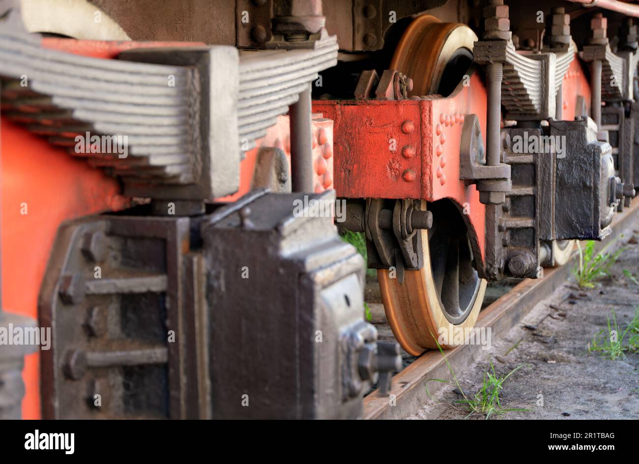 Wheels, buffer springs and axle bearings of an old railway wagon. Stock Photo