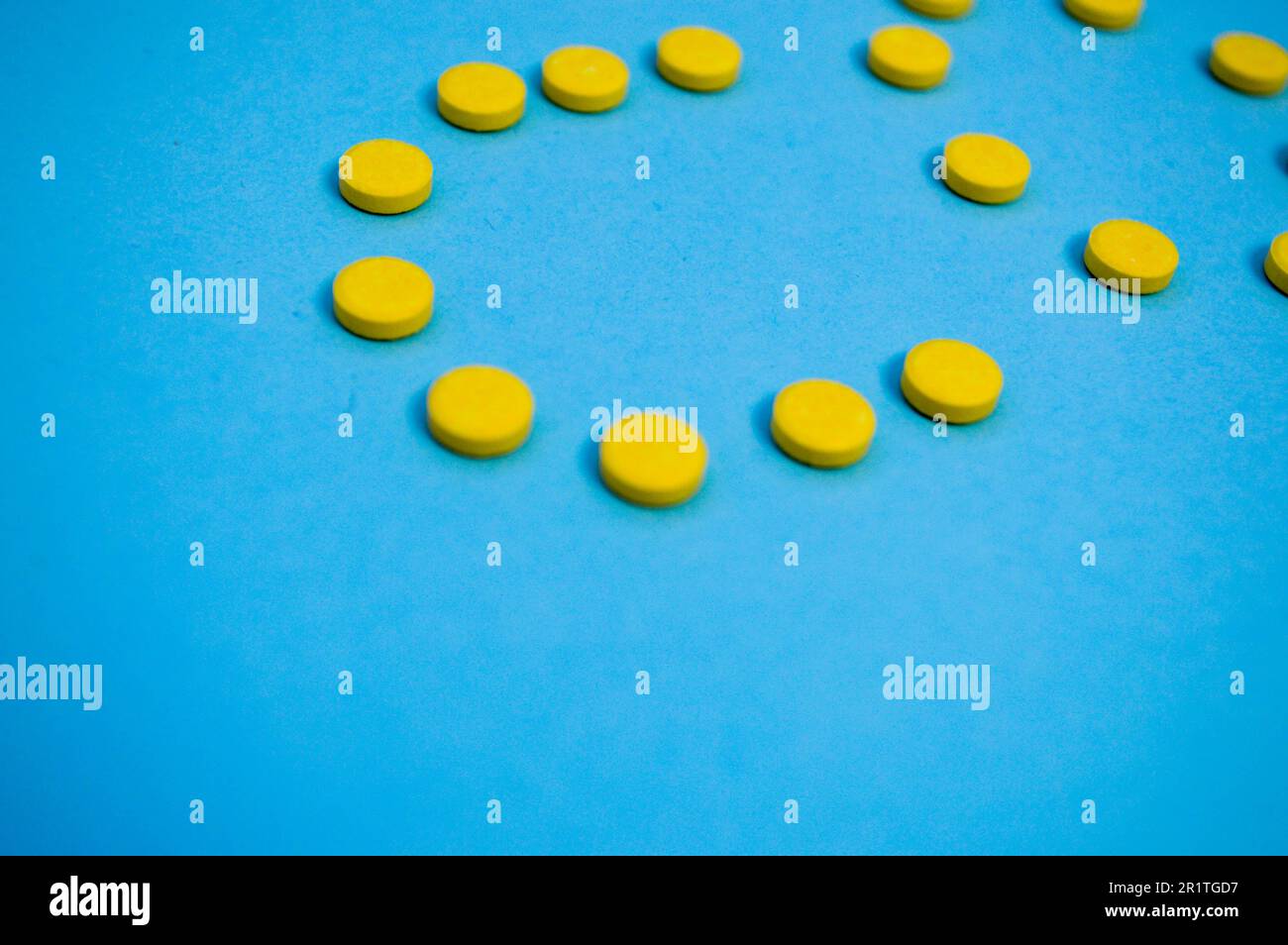 volumetric letters of yellow color in the form of tablets on a blue