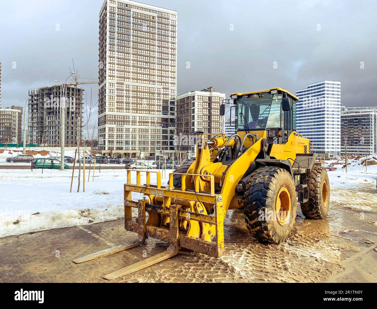 construction equipment on site. construction of houses. bright, yellow