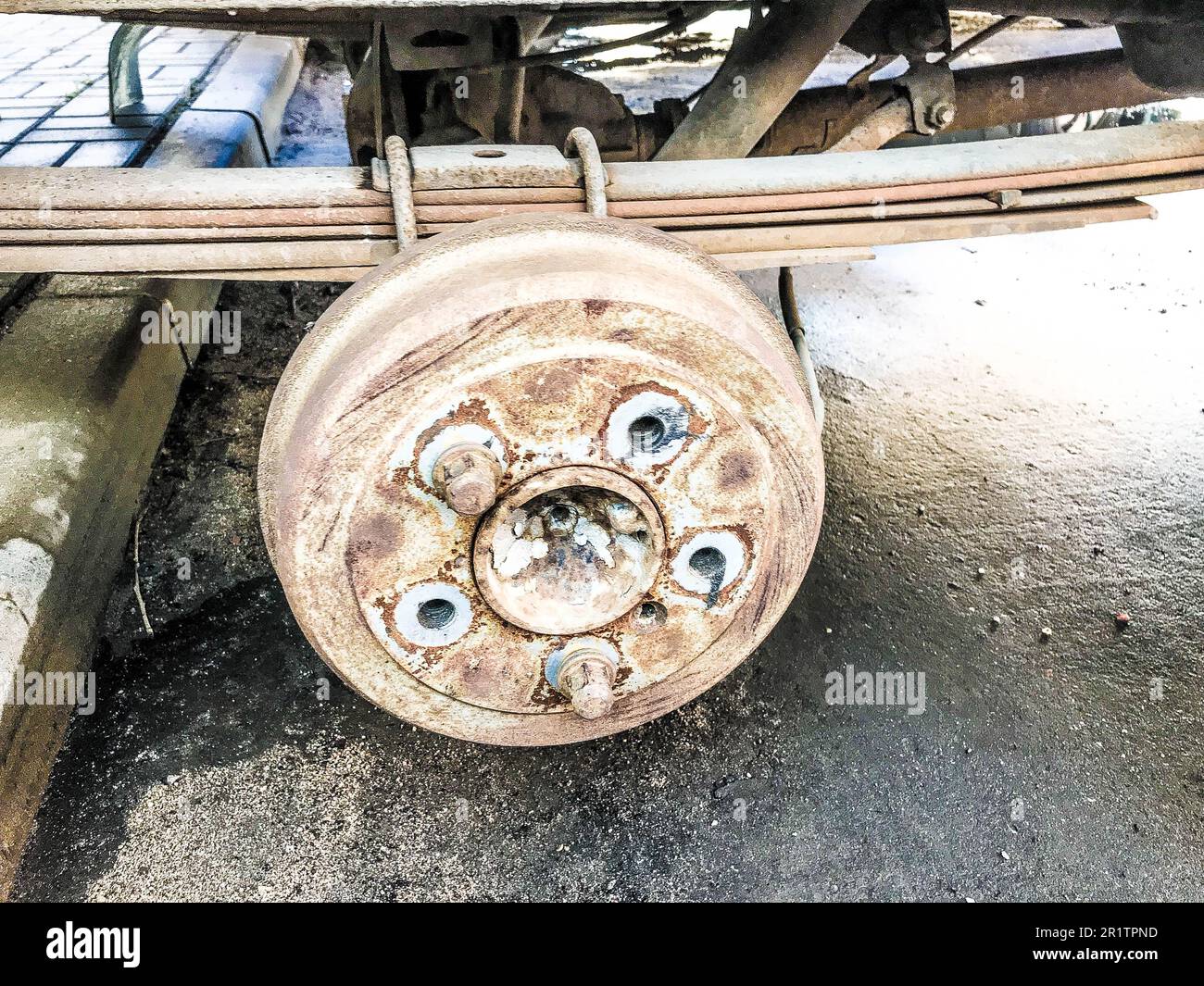 Old rusty worn drum brakes of a truck, car. Automotive suspension