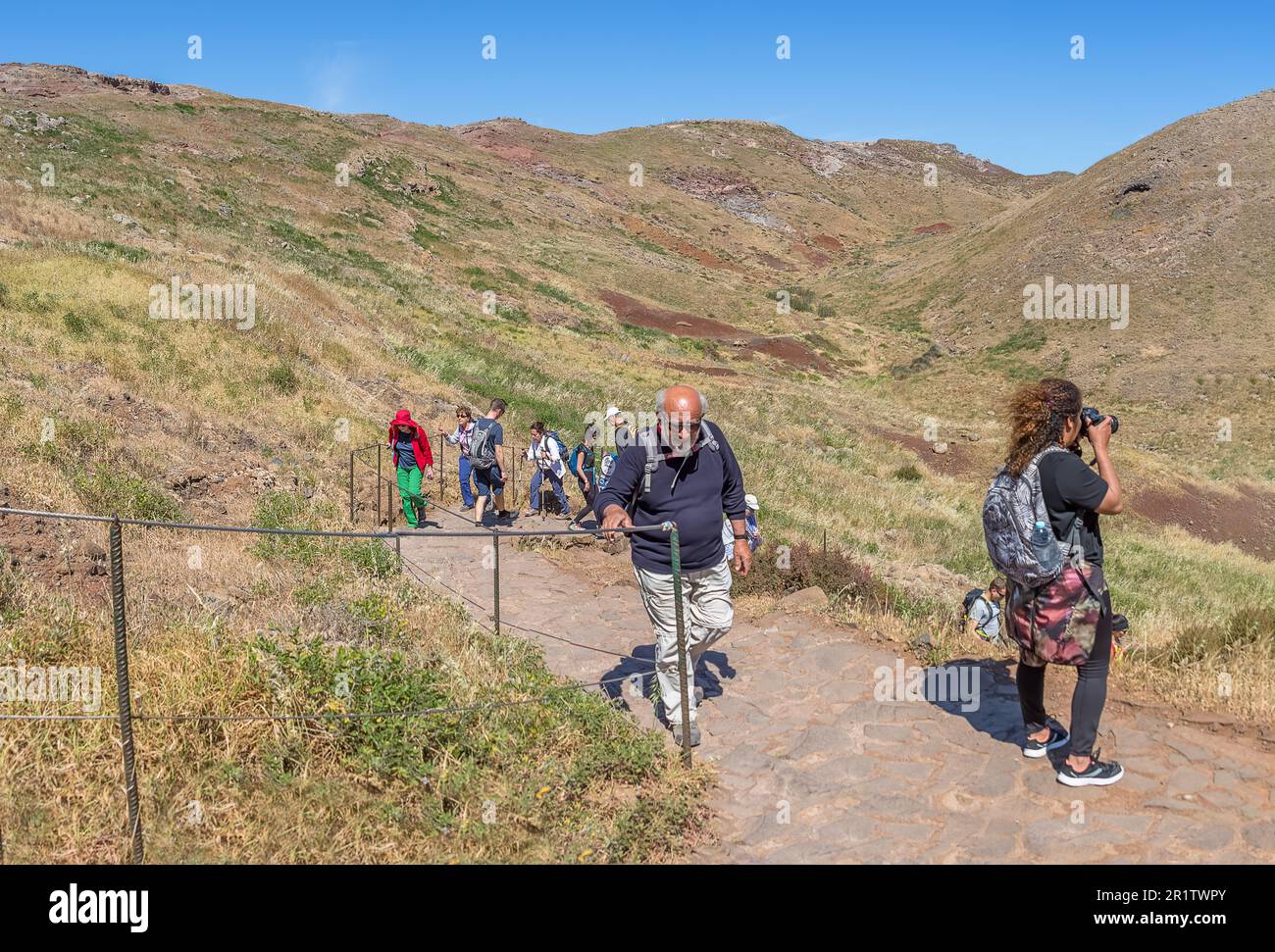 Madeira Island Portugal - 04 19 2023: Panoramic view of a group of tourists hiking in St. Lourenço Cape or Cabo de São Lourenço, on Madeira Island, Po Stock Photo
