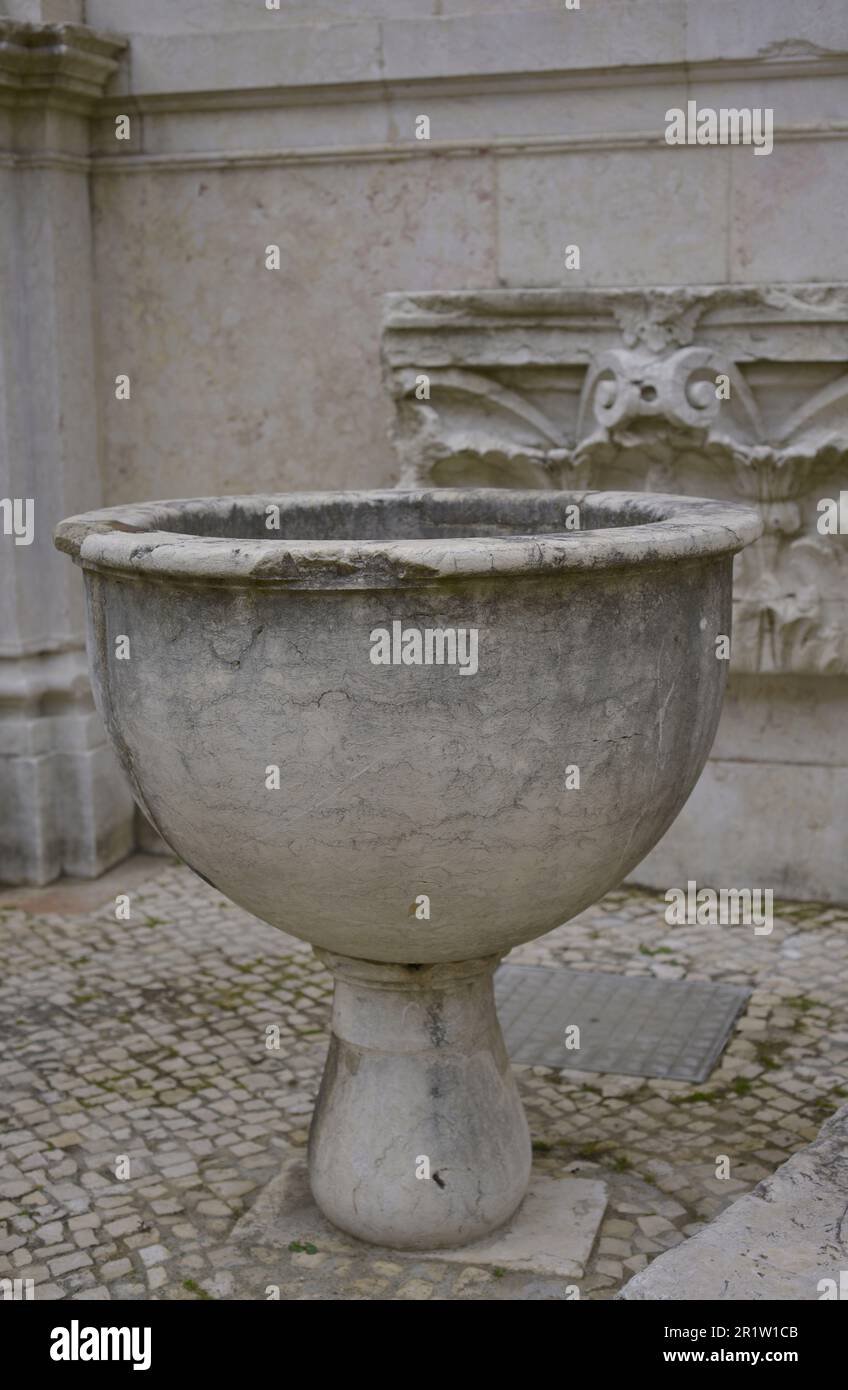 Baptismal font, 15th century. Unknown provenance. Carmo Archaeological Museum. Lisbon, Portugal. Stock Photo