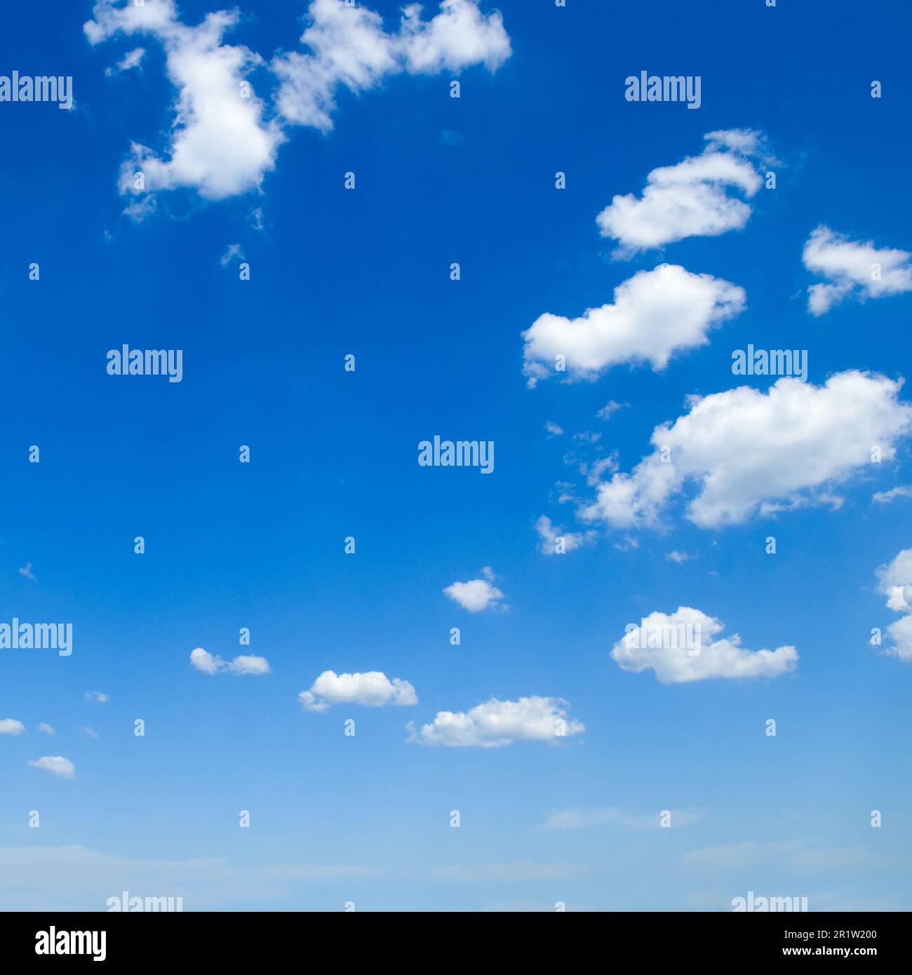 Blue sky with light Cumulus clouds Stock Photo - Alamy