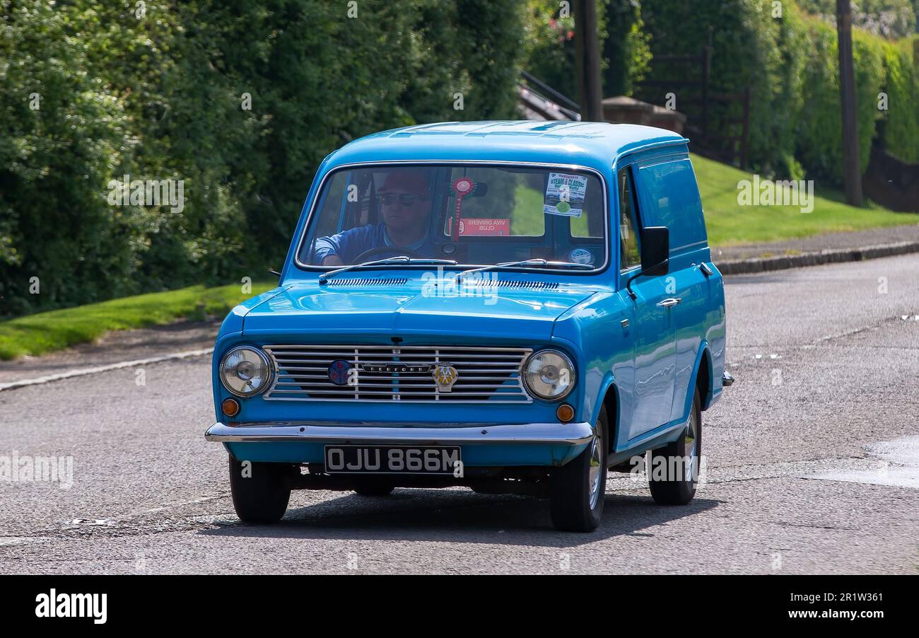 Stoke Goldington,Northants,UK - May 14th 2023. 1973 blue BEDFORD HA van driving through an English village Stock Photo