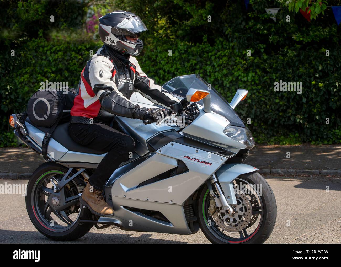 Stoke Goldington,Northants,UK - May 14th 2023. 2002 APRILIA FUTURA motorcycle travelling through an English village Stock Photo