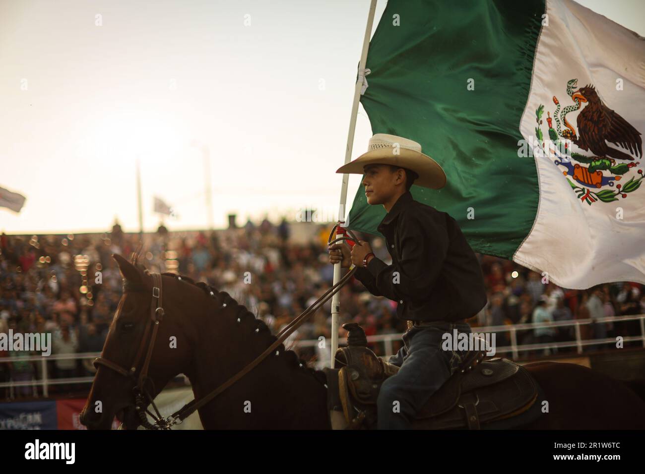 Cowboys, during the rodeo circuit at the Expo Ganadera de Sonora, on ...