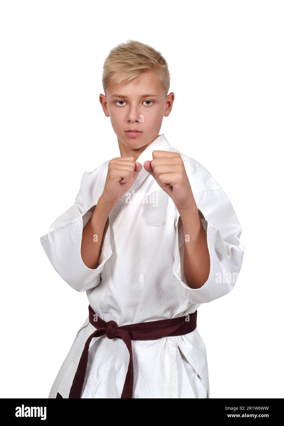 karate boy in white kimono with brown belt Stock Photo Alamy