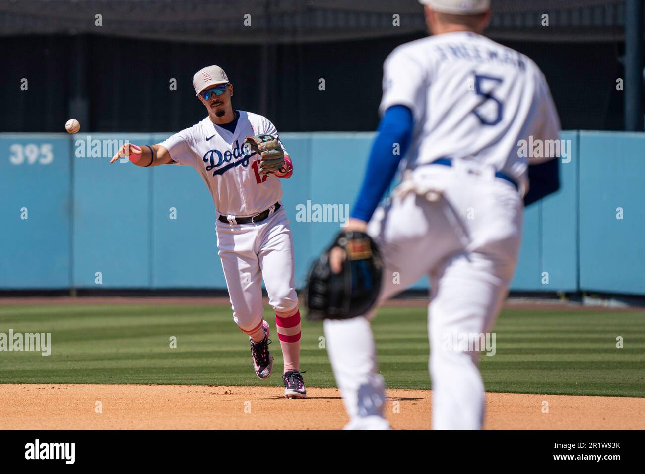 Los Angeles Dodgers second baseman Miguel Vargas (17) throws to first