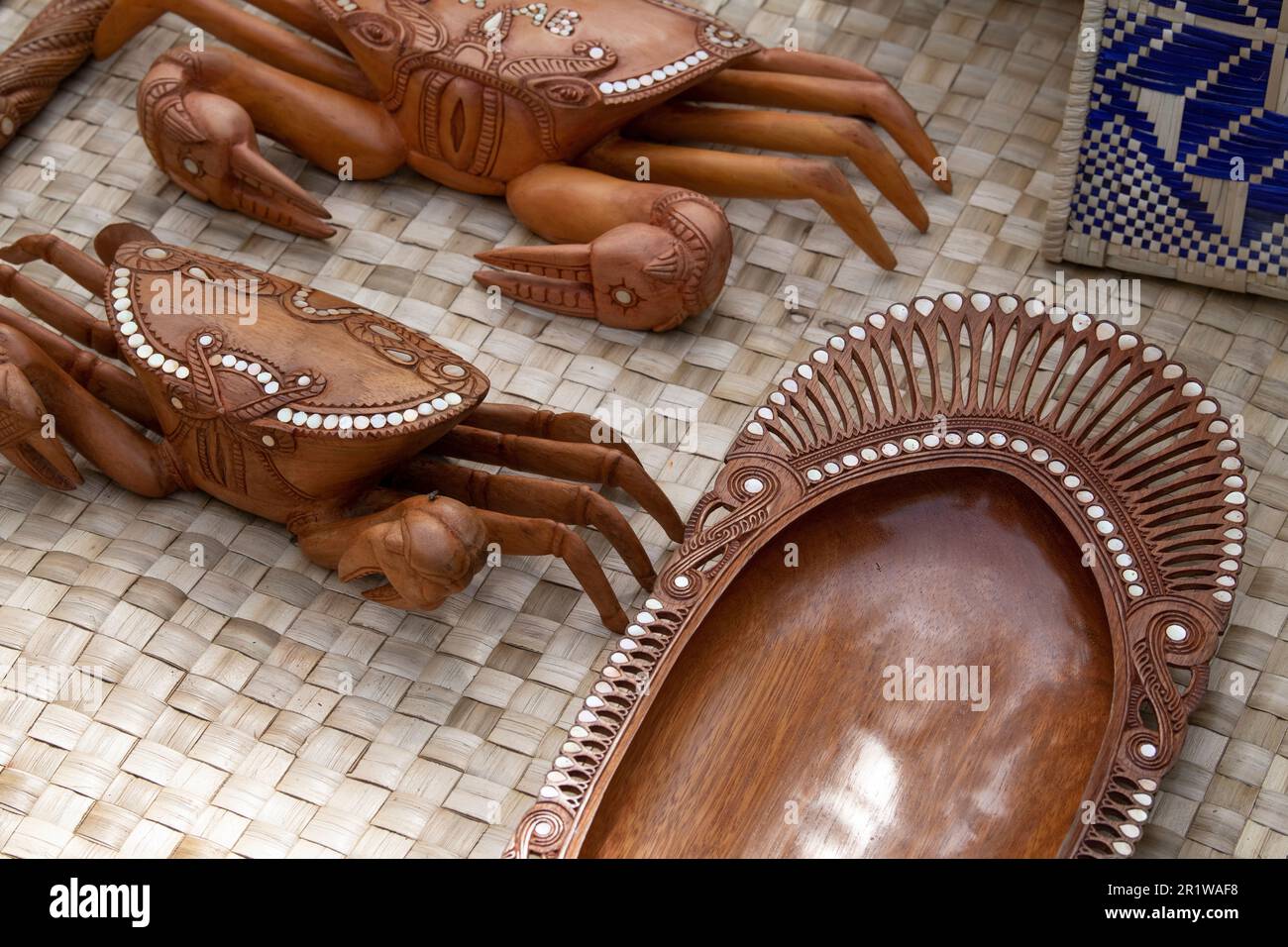 Papua New Guinea, Trobriand Islands, Milne Bay Province,  Kuiawa Island aka Kuyau. Traditional hand carved wooden bowl with shell inlay. Stock Photo