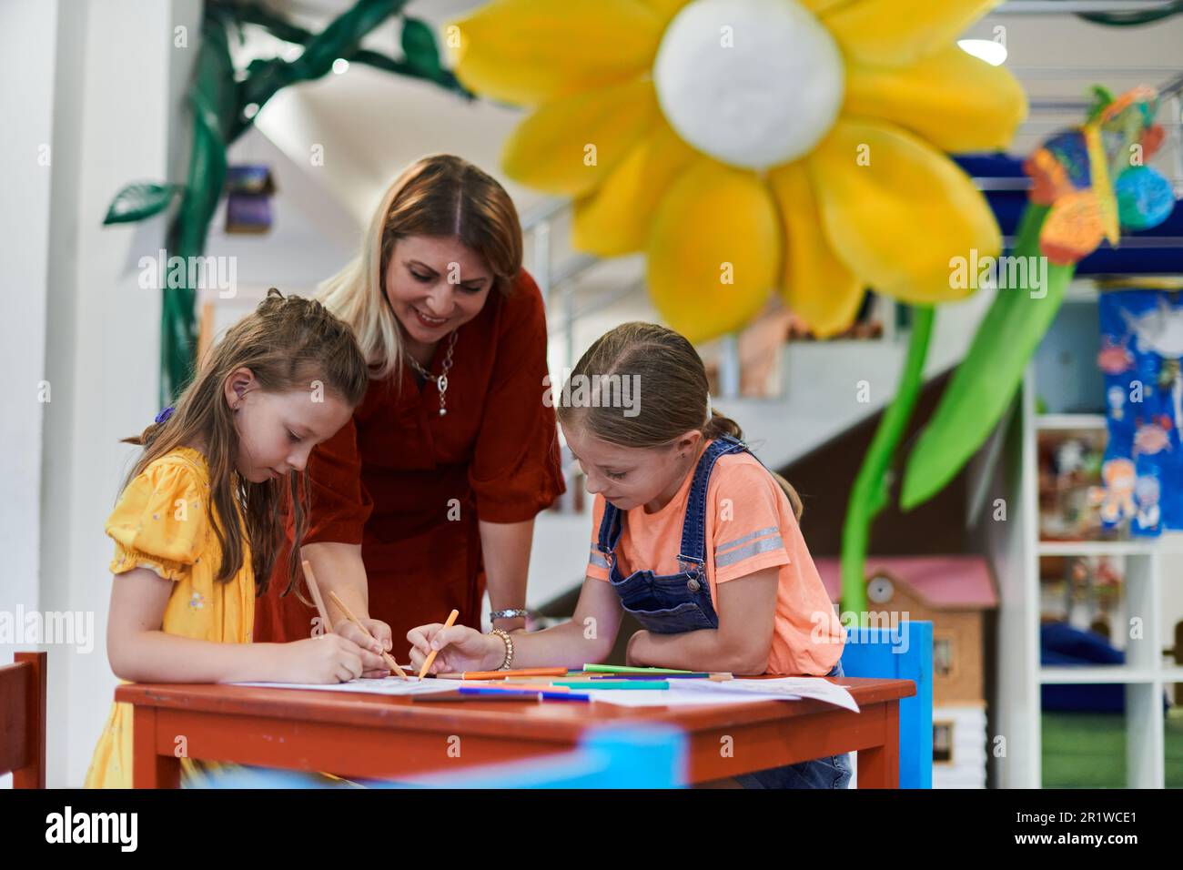 Creative kids during an art class in a daycare center or elementary ...