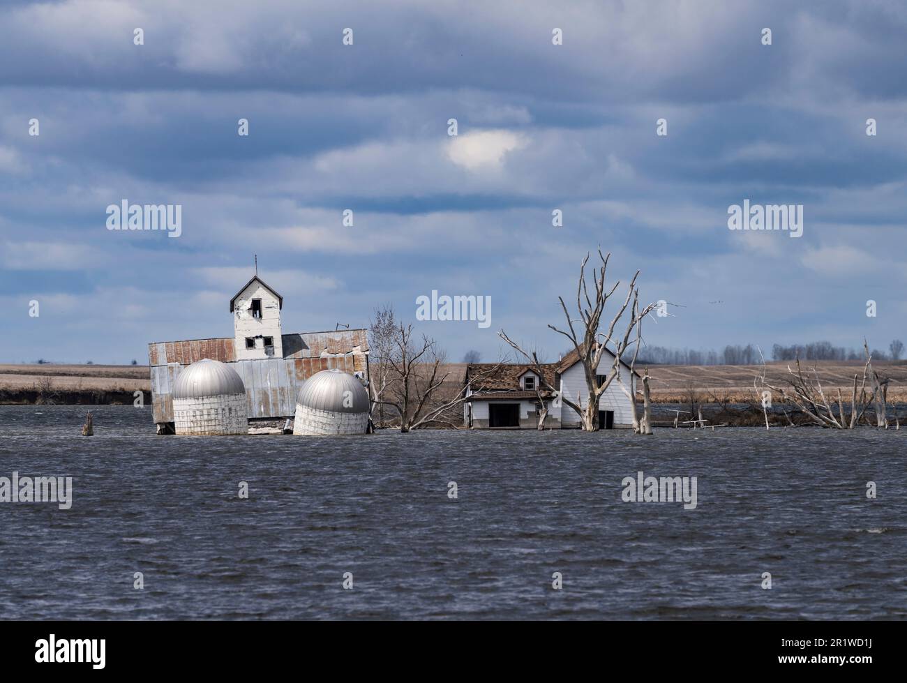 Farm buildings partially submerged in a lake near ster, South Dakota