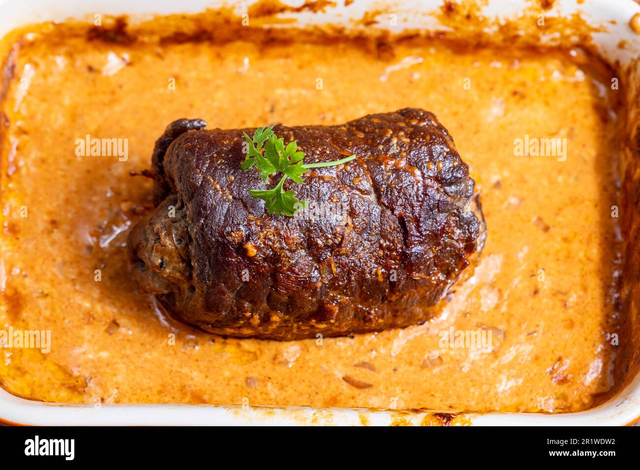 german meat roulade in a casserole Stock Photo Alamy