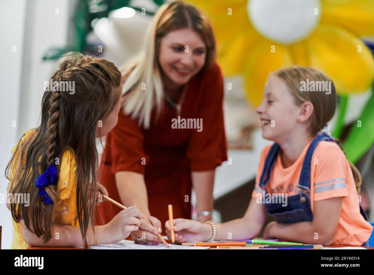 Creative kids during an art class in a daycare center or elementary ...