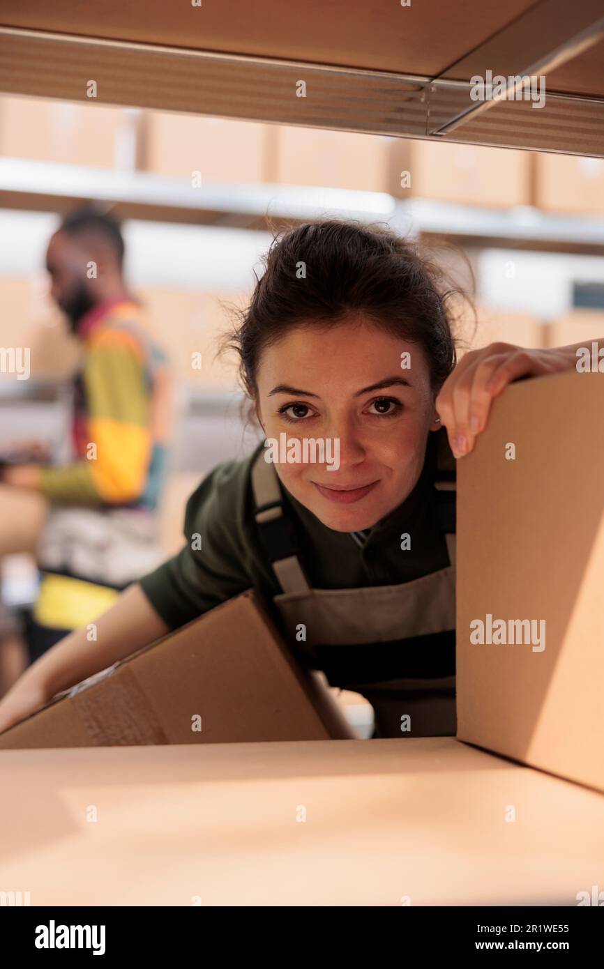 smiling-employee-working-with-cardboard-boxes-stock-photo-alamy