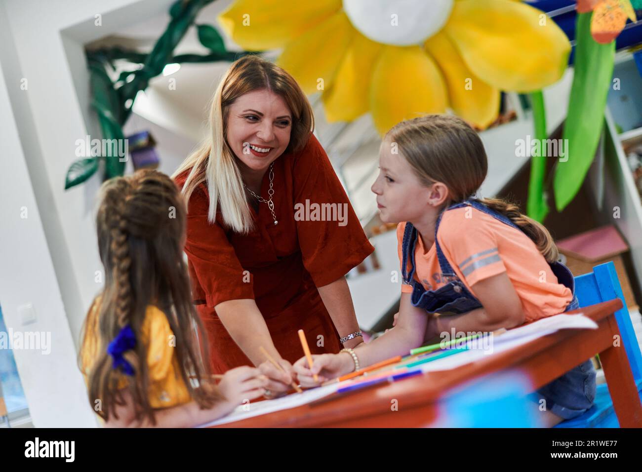 Creative kids during an art class in a daycare center or elementary ...