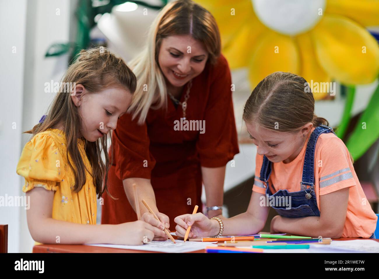 Creative kids during an art class in a daycare center or elementary ...