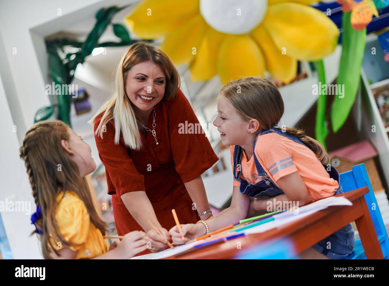 Creative kids during an art class in a daycare center or elementary ...