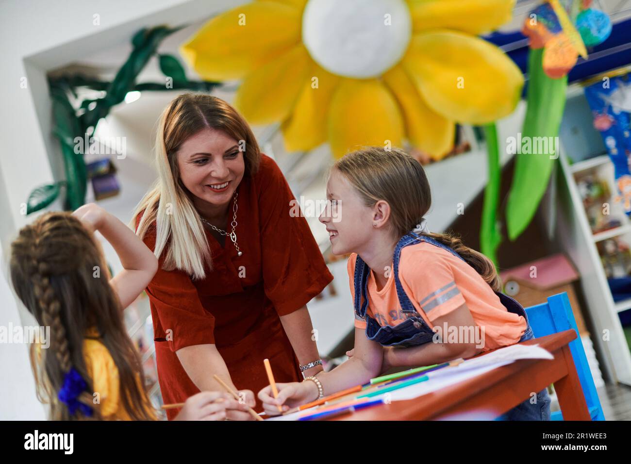 Creative kids during an art class in a daycare center or elementary ...