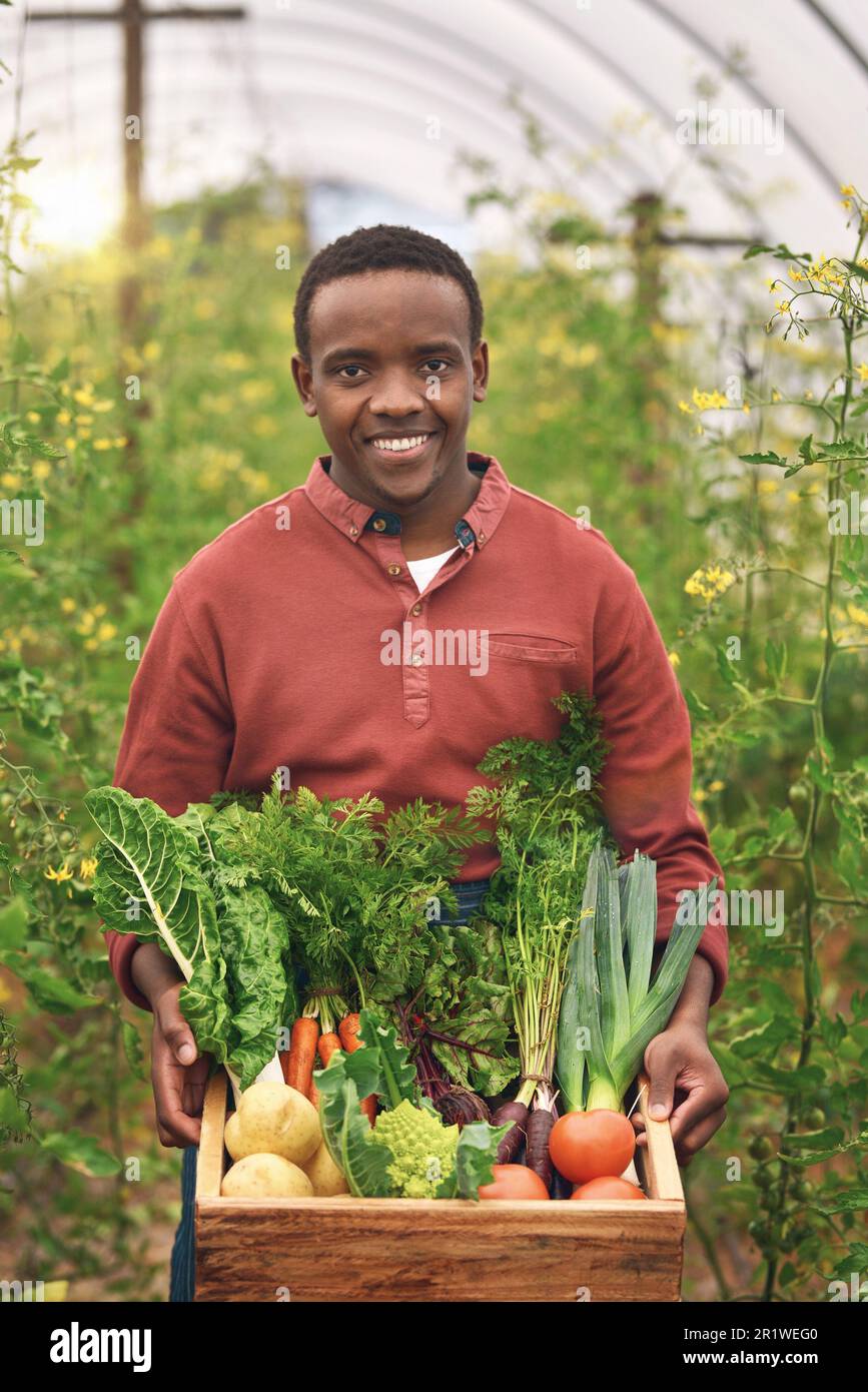 Fresh produce. Cropped portrait of a handsome young male farmer