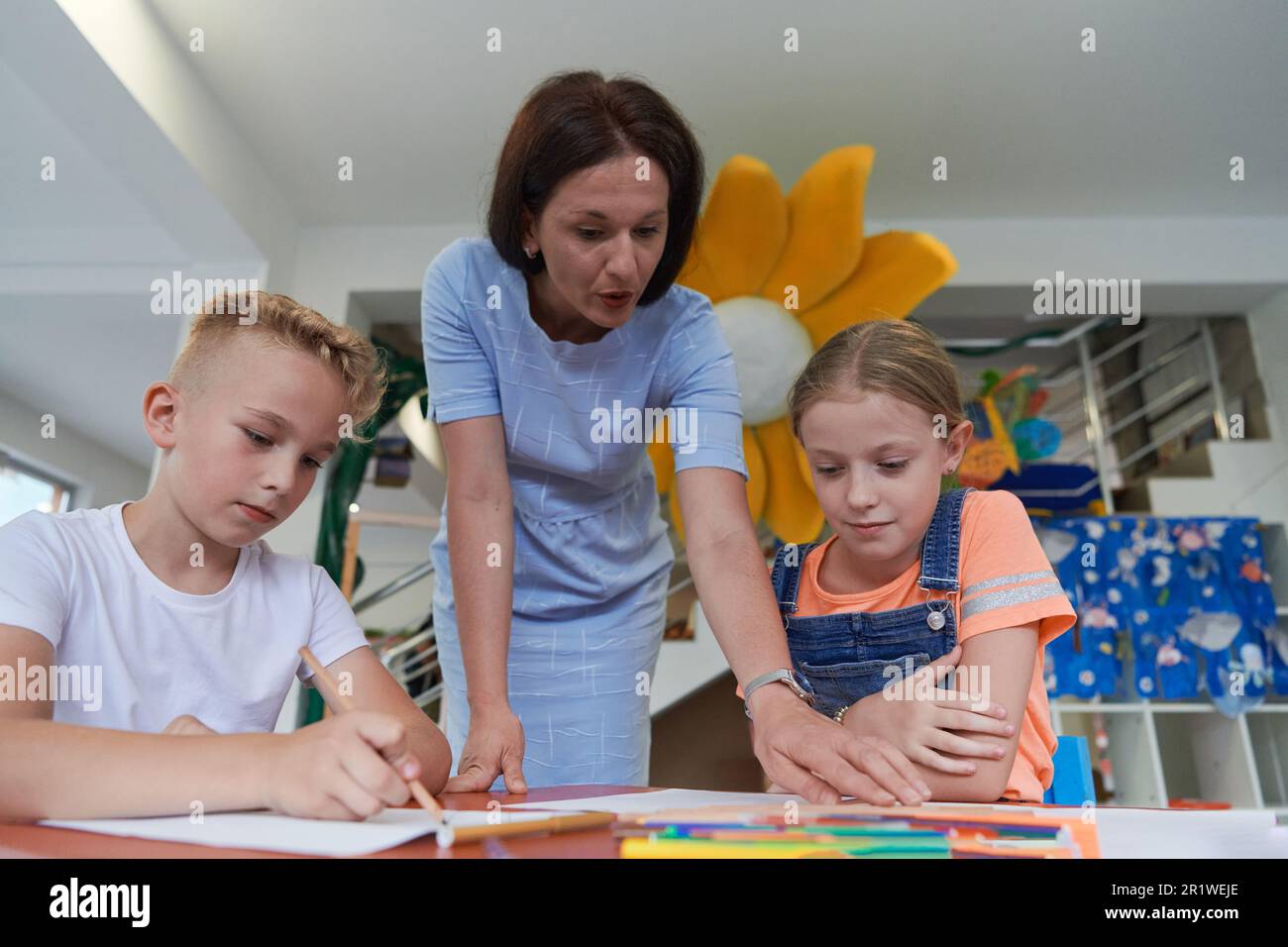 Creative kids during an art class in a daycare center or elementary ...