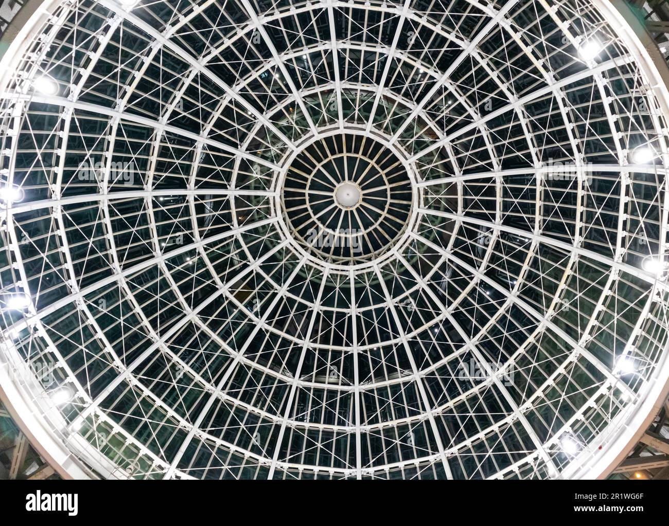 Glass dome or round window in the roof. Architectural fashion motifs in