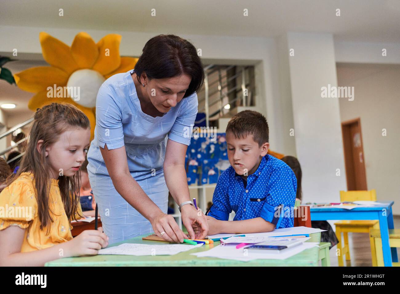 Creative kids during an art class in a daycare center or elementary ...
