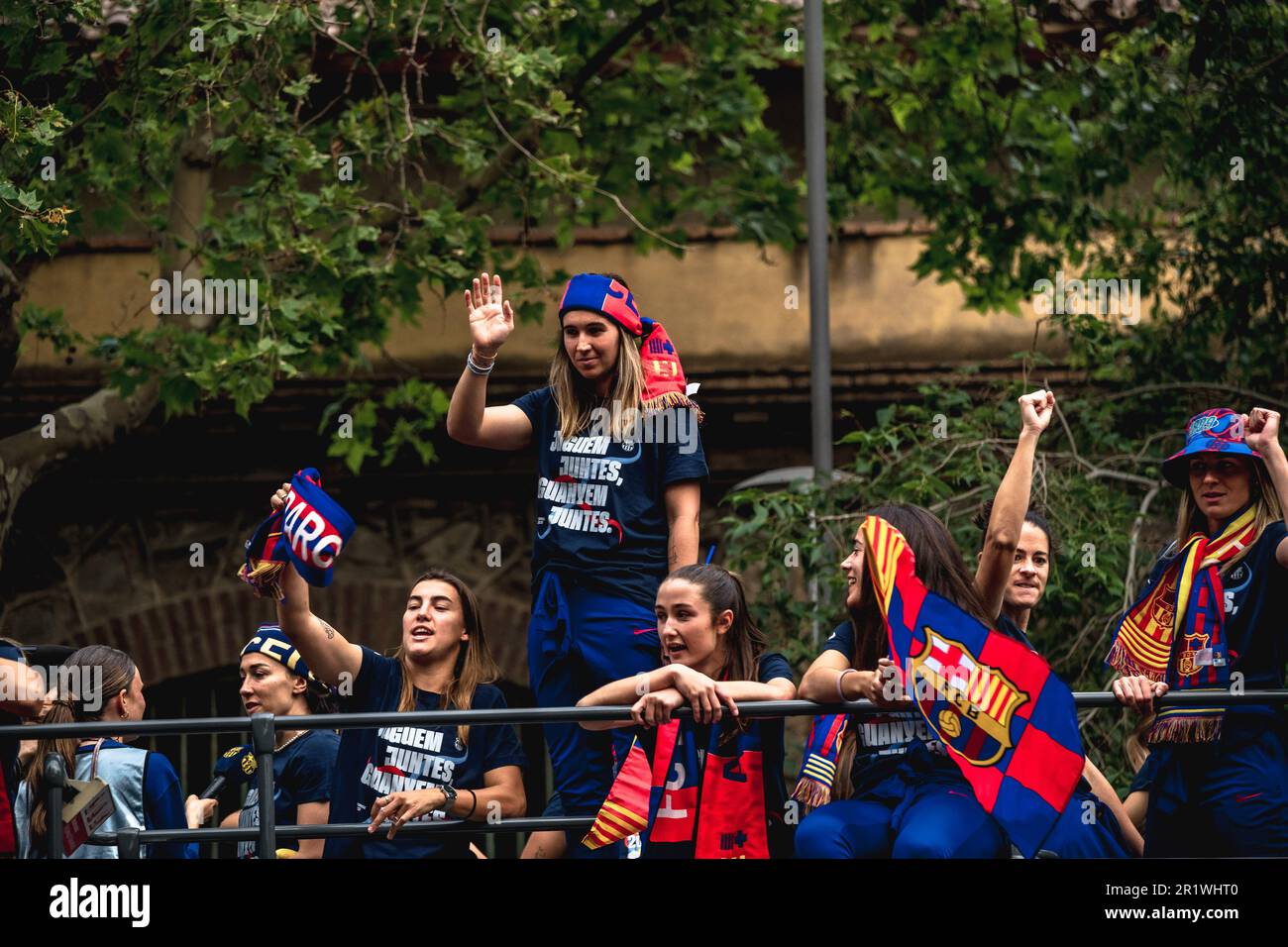 Barcelona, Spain. 15th May, 2023. The female team from the FC Barcelona rides in an open top bus through the city centre during a victory parade celebrating their league title Credit: Matthias Oesterle/Alamy Live News Stock Photo