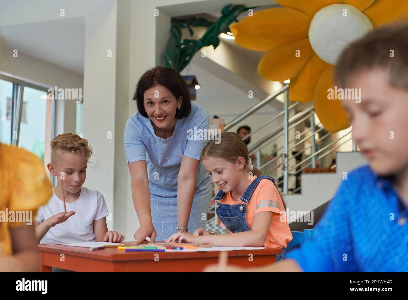 Creative kids during an art class in a daycare center or elementary ...
