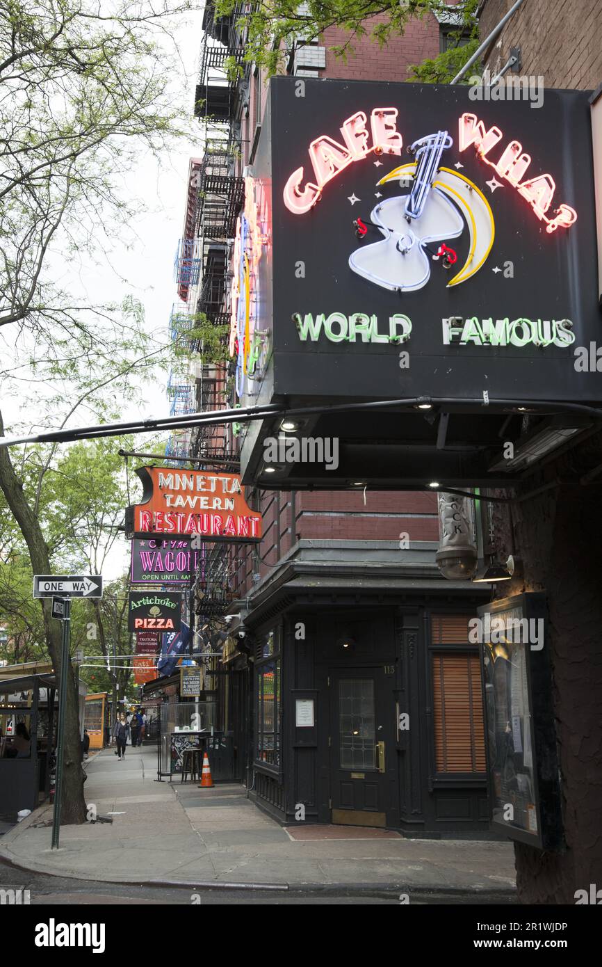 The world famous Cafe Wha and other establishments along MacDougal Street in Greenwich Village, New York City. Stock Photo