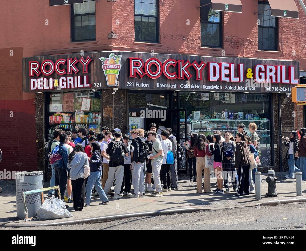High School students socialize on the corner near Brooklyn Tech High