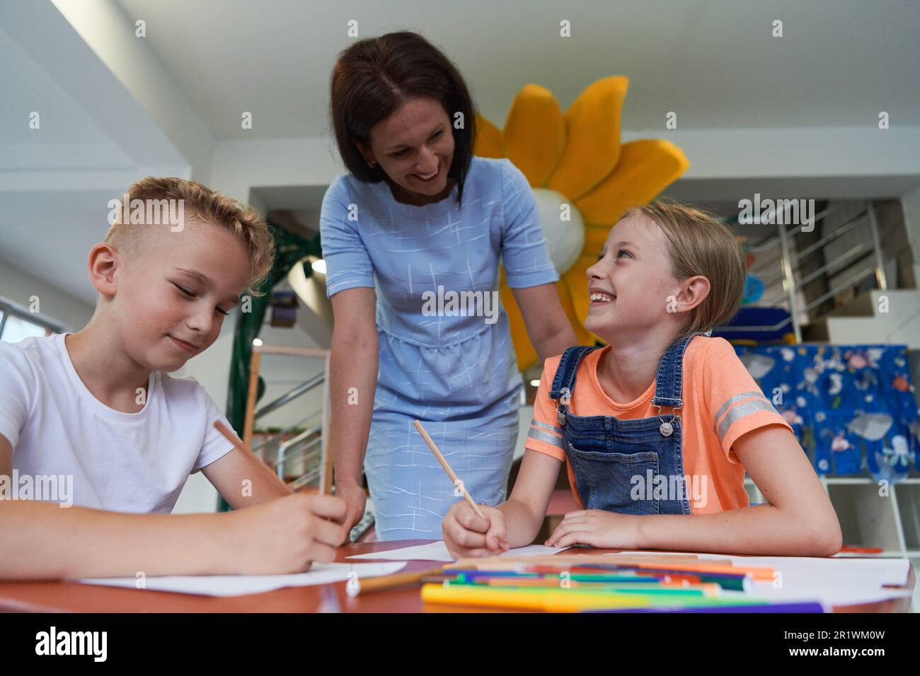 Creative kids during an art class in a daycare center or elementary ...