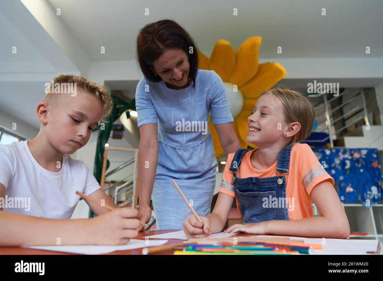Creative kids during an art class in a daycare center or elementary ...