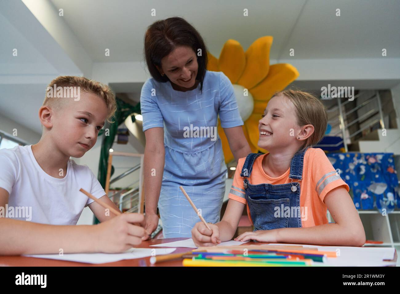 Creative kids during an art class in a daycare center or elementary ...