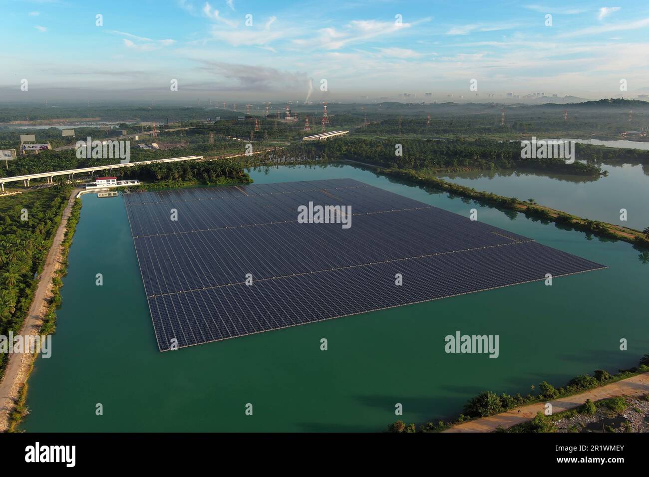 Rows of floating solar panels work on May 3, 2023, in Selangor ...