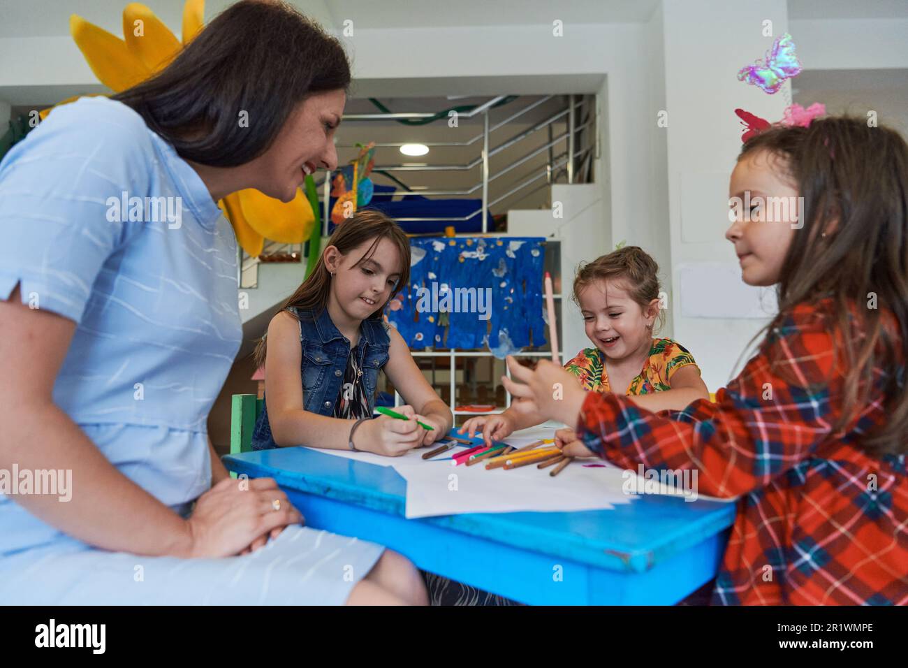 Creative kids during an art class in a daycare center or elementary ...